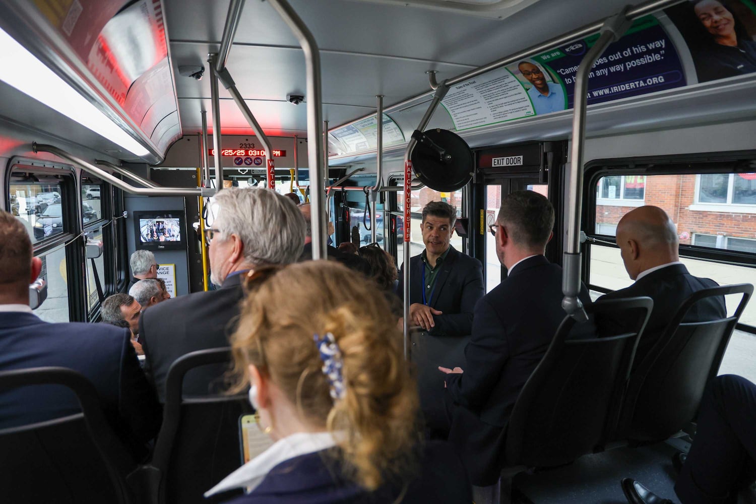 Bus transports NATO delegates to Roger Glass Center for the Arts