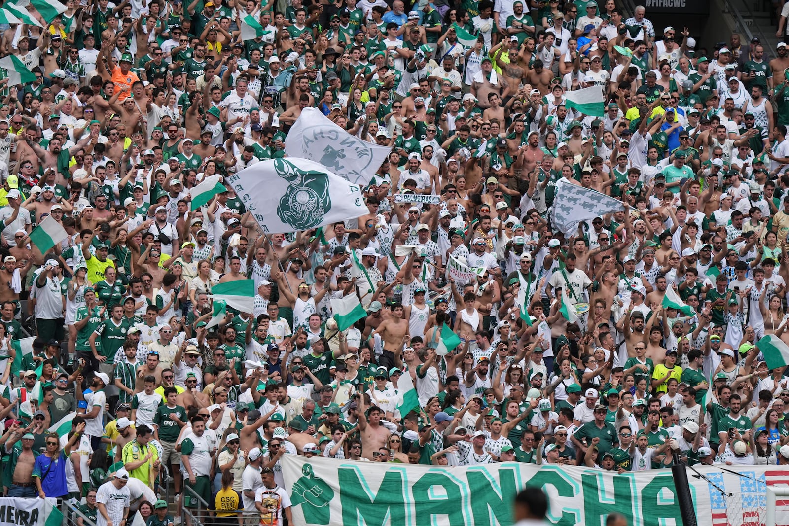 Palmeiras fans cheer during the Club World Cup group A soccer match between Palmeiras and Al Ahly in East Rutherford, N.J., Thursday, June 19, 2025. (AP Photo/Frank Franklin II)