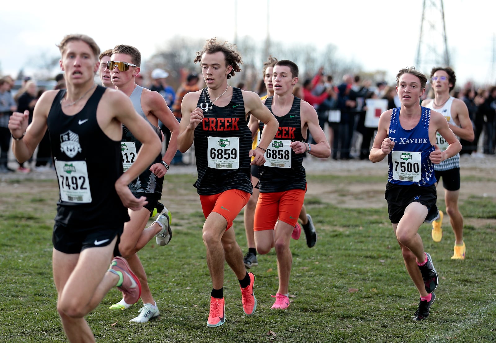 Beavercreek seniors Jackson Davis (6859) and Aiden Allen (6858) run at the 2025 OSHAA Division I State Cross Country Championships, Sat., Nov. 1, 2025, at Fortress Obetz in Columbus. STEVEN WRIGHT / STAFF