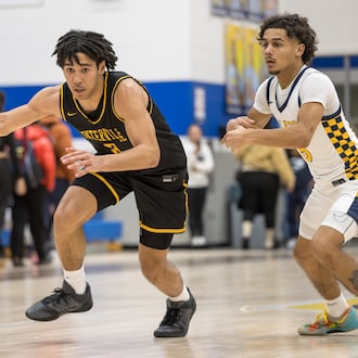 The Centerville High School boys basketball team beat Springfield 56-44 on Tuesday, Feb. 3, 2026 to win their eighth straight Greater Western Ohio Conference championship. MICHAEL COOPER / STAFF
