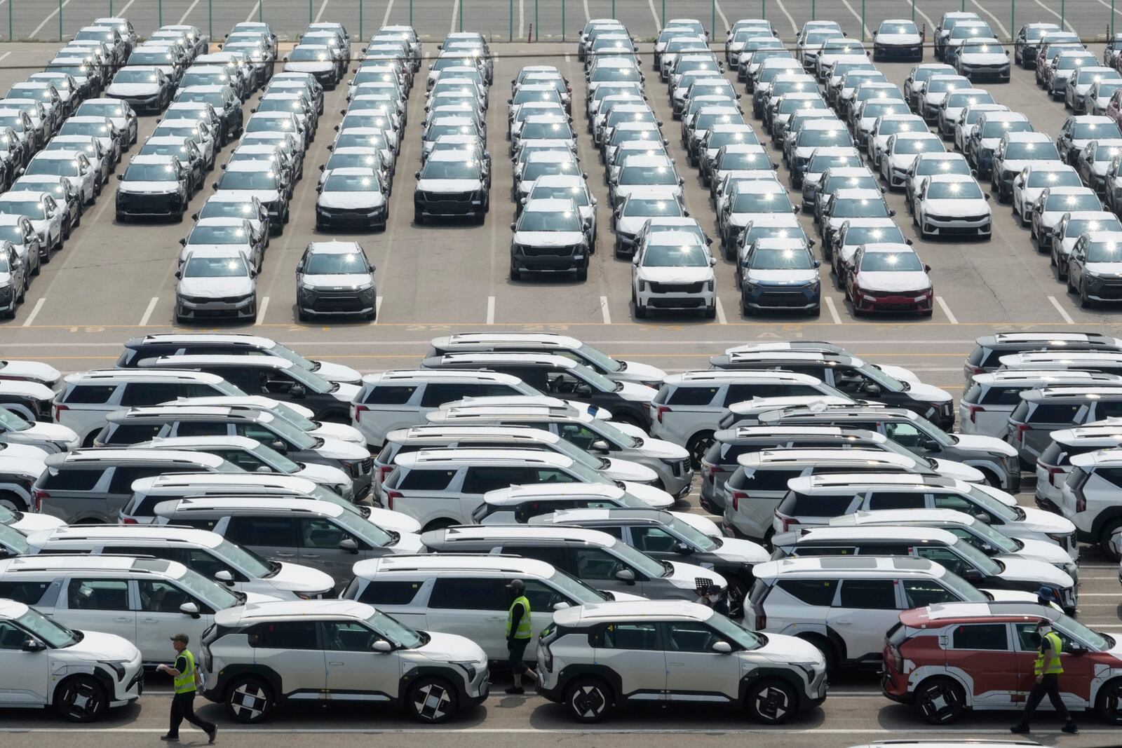 Vehicles for export are parked at a port in Pyeongtaek, South Korea, Tuesday, July 8, 2025. (AP Photo/Ahn Young-joon)