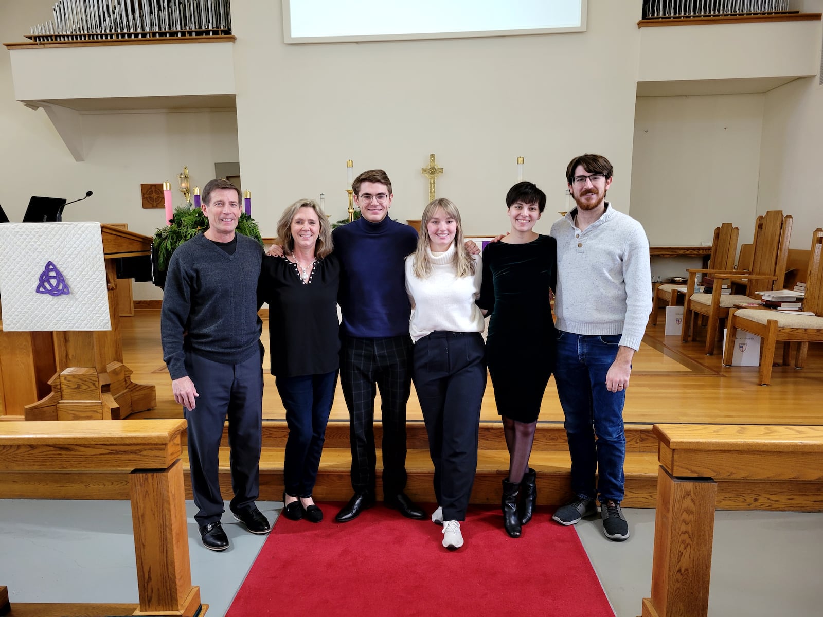 The Corfman Family at Saint Anne Episcopal Church in West Chester where Julie is the choir director and organist: (from the left) David and Julie Corfman; son Erich and his girlfriend Julia Koehler; and son Philipp with his wife Melinda Glass. CONTRIBUTED PHOTO