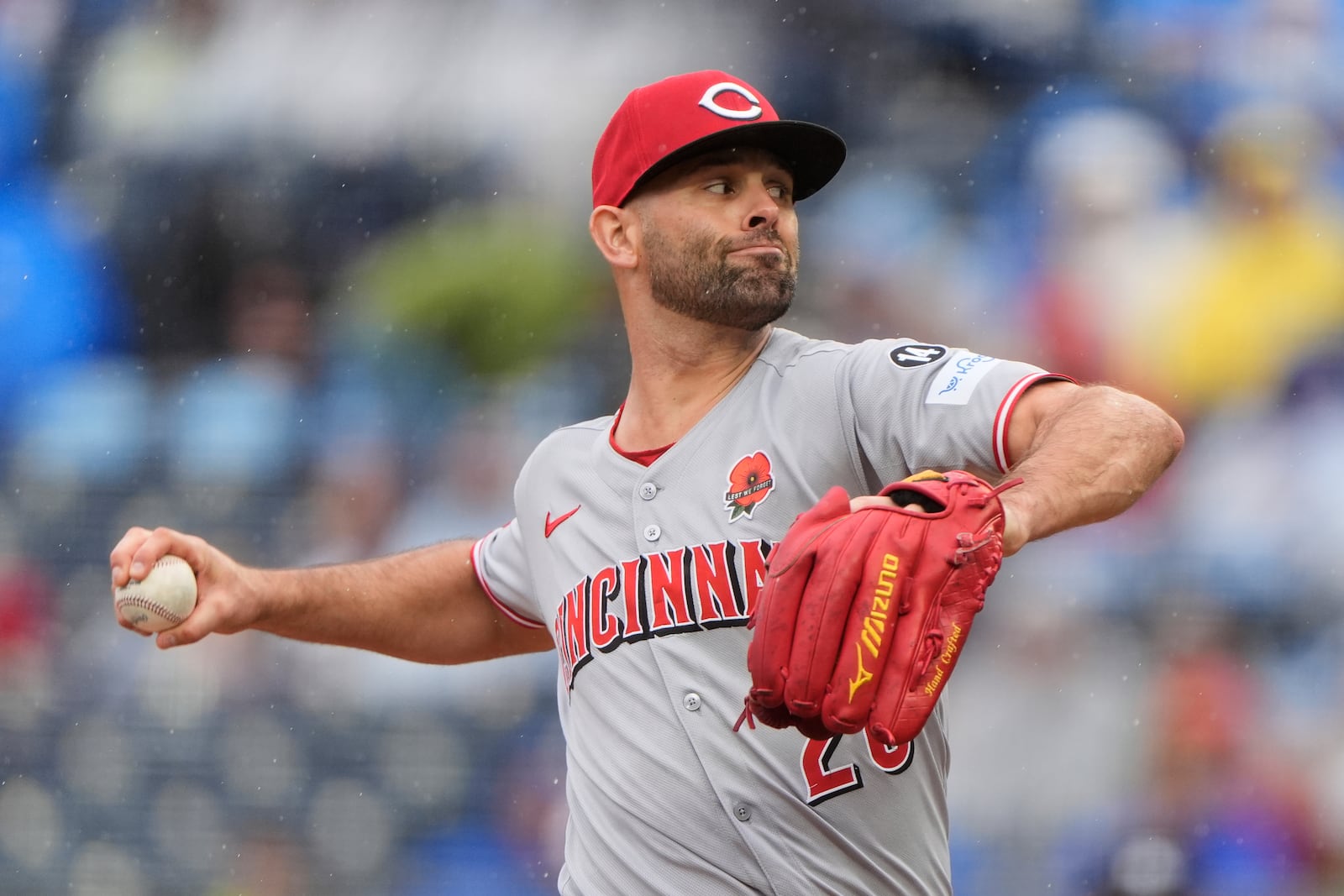 Cincinnati Reds starting pitcher Nick Martinez throws during the first inning of a baseball game against the Kansas City Royals, Monday, May 26, 2025, in Kansas City, Mo. (AP Photo/Charlie Riedel)