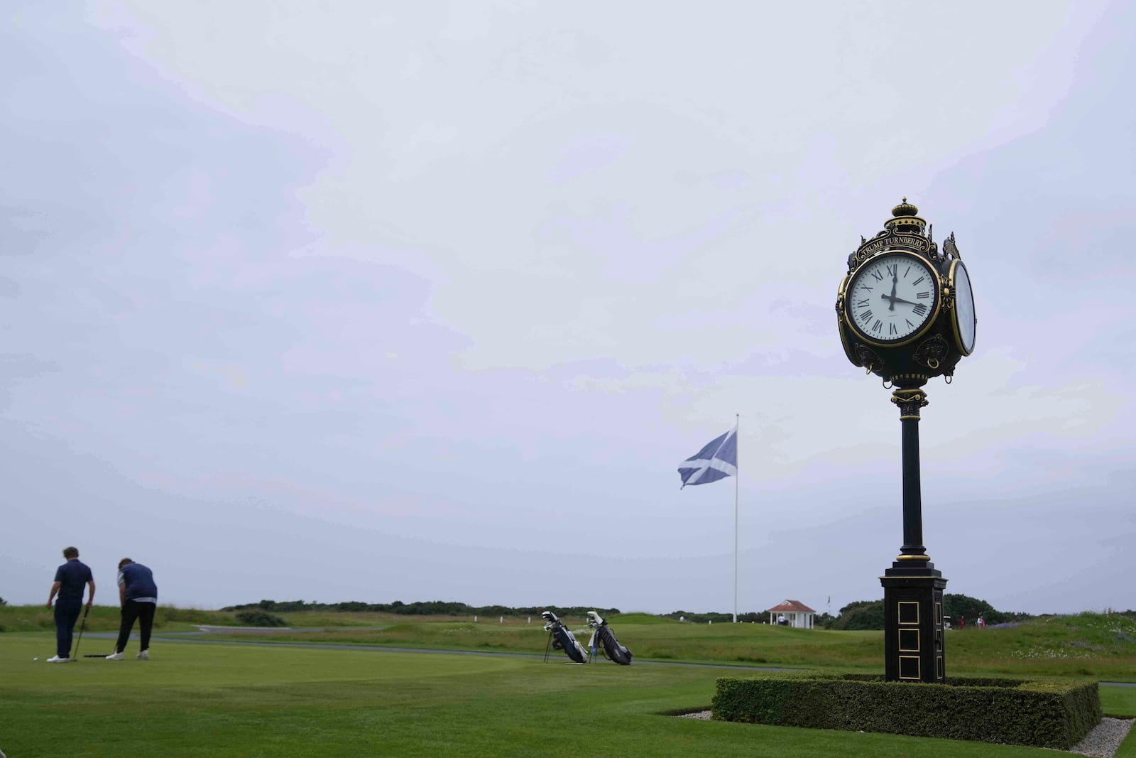 Golfers on the putting green at the Trump Turnberry golf course in Turnberry, Scotland, Wednesday, July 23, 2025, President Trump is expected to visit Scotland in the next few day. (AP Photo/Alastair Grant)