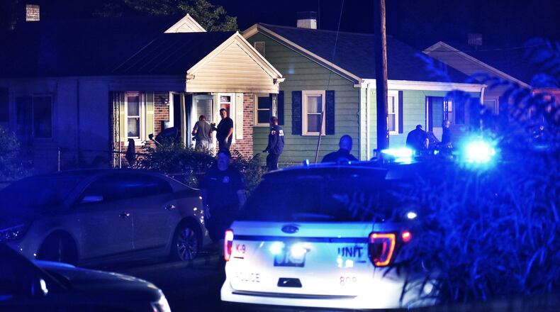 Middletown fire and police crews responded to a house fire Friday evening, Aug. 14, 2020, in the 1200 block of Lind Street. NICK GRAHAM/STAFF