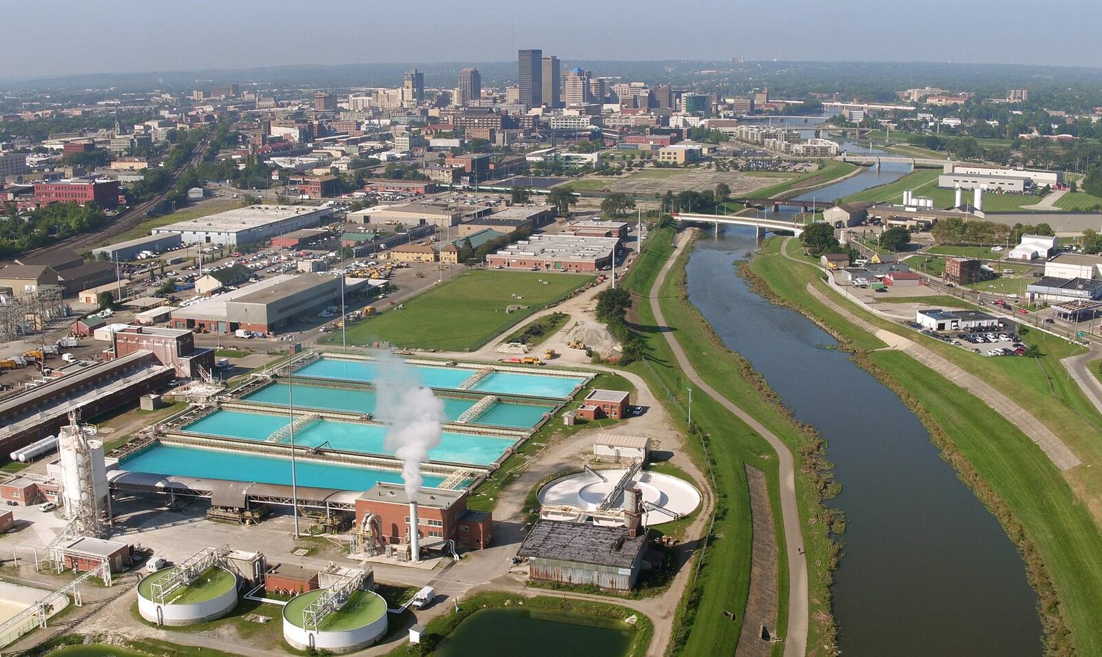 The Mad River flows past the City of Dayton’s Ottawa water treatment plant on the east side of Dayton. Tests indicated that polyfluoralkyl substances (PFAS) were present in the drinking water in 2018 even after some contaminated wells were shut down last year. TY GREENLEES / STAFF