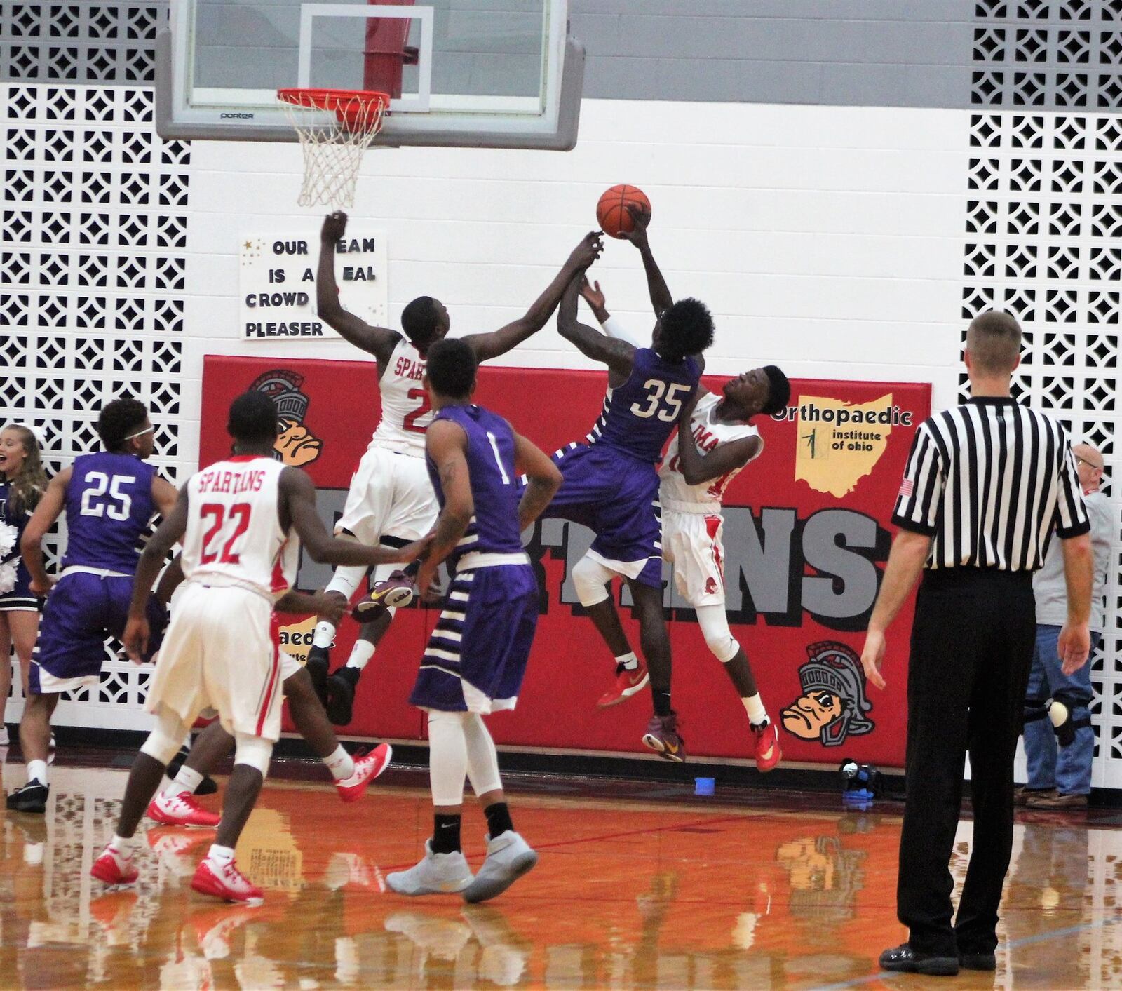 Middletown’s Jomar Bailey (35) puts up a shot in traffic during Friday night’s game against host Lima Senior. CONTRIBUTED PHOTO BY MARITZA MCKINNEY