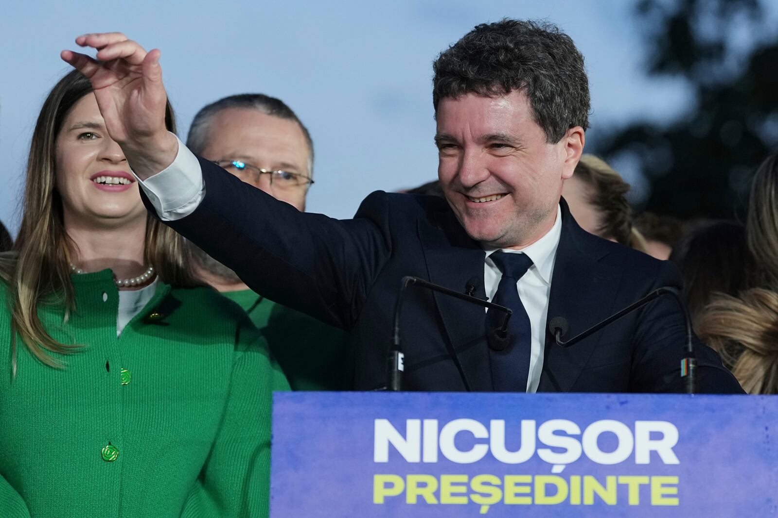 Presidential candidate Nicusor Dan speaks to media after polls closed for the second round of the country's presidential election redo in Bucharest, Romania, Sunday, May 18, 2025. (AP Photo/Andreea Alexandru)