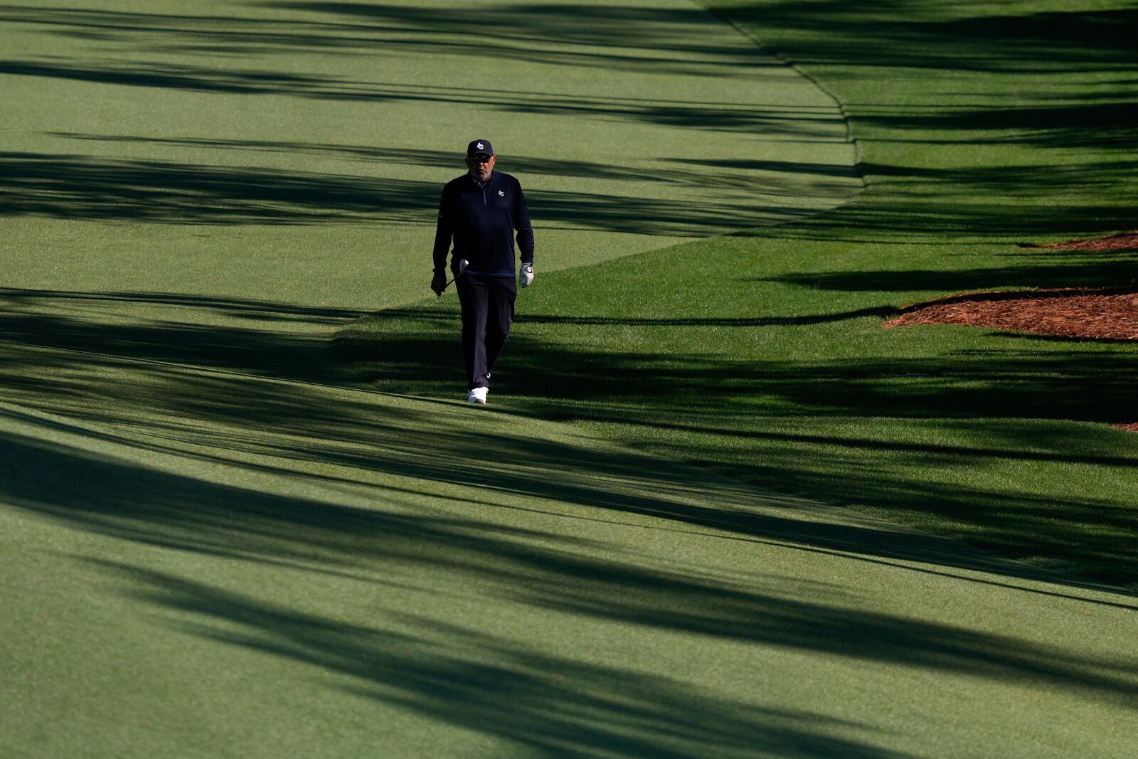 Angel Cabrera, of Argentina, walks up the 10th fairway during a practice round at the Masters golf tournament, Tuesday, April 8, 2025, in Augusta, Ga. (AP Photo/Matt Slocum)
