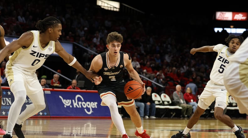 Miami’s Luke Skaljac (3) dribbles the ball against Akron on Saturday at Millett Hall. ELIJAH COOK / CONTRIBUTED