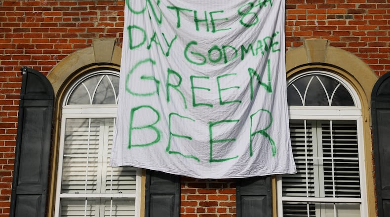 Miami University students and Oxford residents wear green for St. Patrick's Day and celebrating at local establishments Thurs., March 16, 2023. Green Beer Day has been a tradition in the town for many years. The actual St. Paddy's Day holiday is Friday. NICK GRAHAM/STAFF