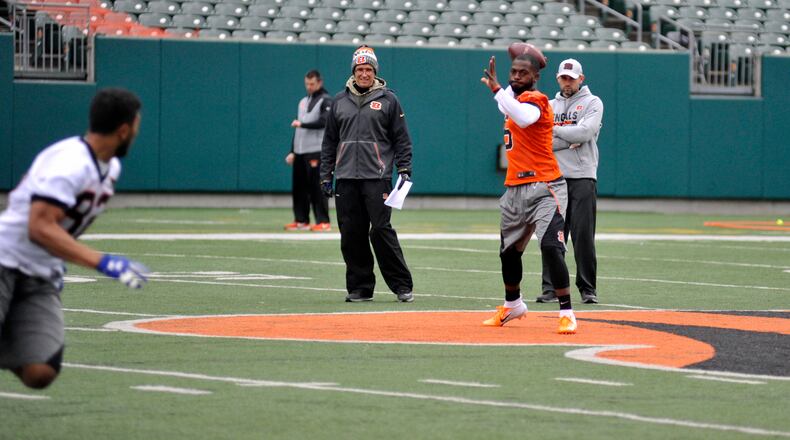Former Ohio State quarterback J.T. Barrett throws a pass during the Cincinnati Bengals local player workout Tuesday at Paul Brown Stadium.