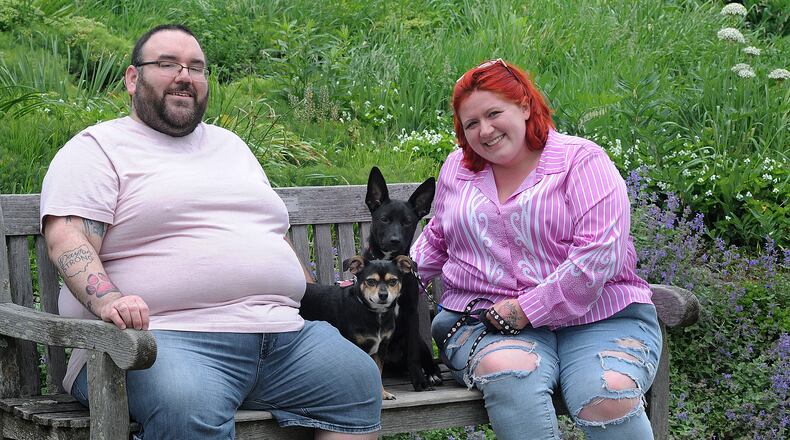 Michael and Morgan Garrison distributed hundreds of pink tennis balls to animal shelters in honor of their dog, Sarah Lynn, who died earlier this year. A Pink tennis ball was the favorite toy of Sara Lynn. MARSHALL GORBY\STAFF