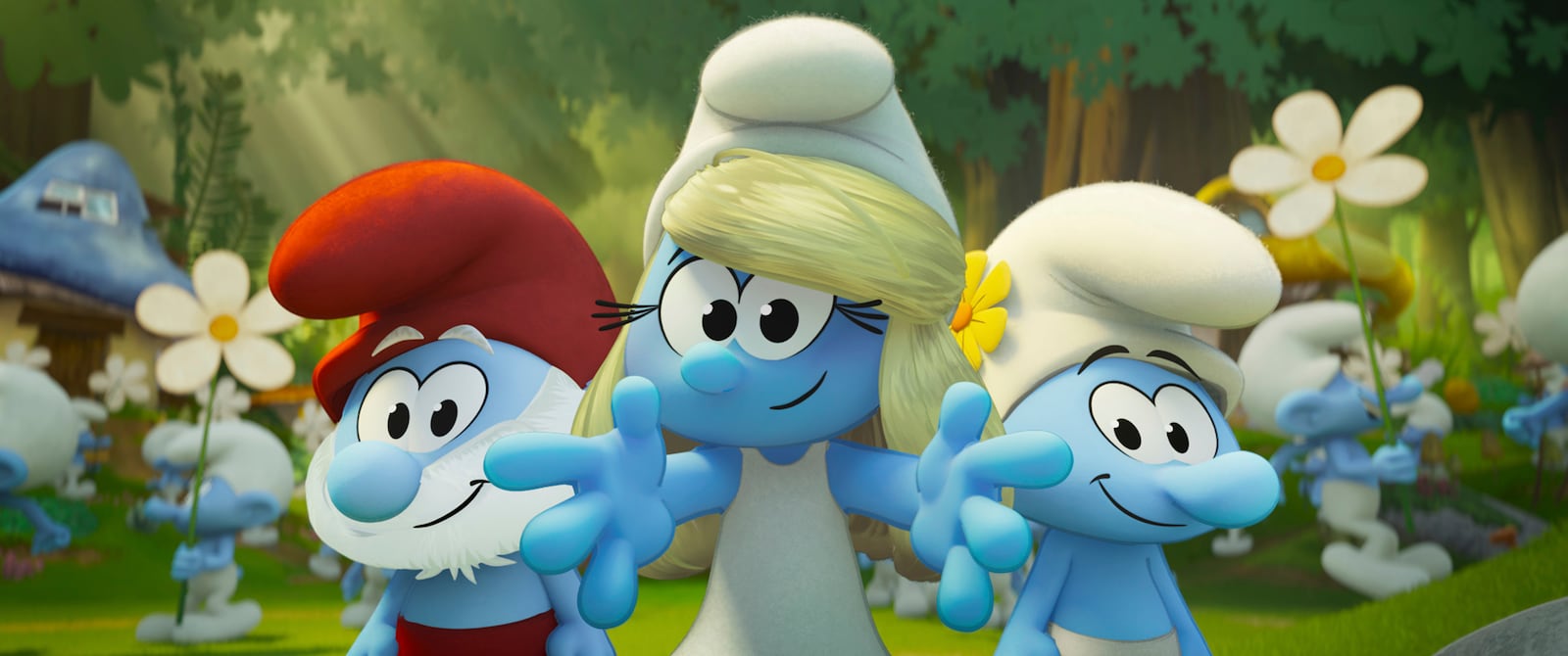 This image released by Paramount Animation shows characters Papa Smurf, voiced by John Goodman, Smurfette, voiced by Rihanna and Vanity Smurf, voiced by Maya Erskine, from the film "Smurfs." (Paramount Animation via AP)