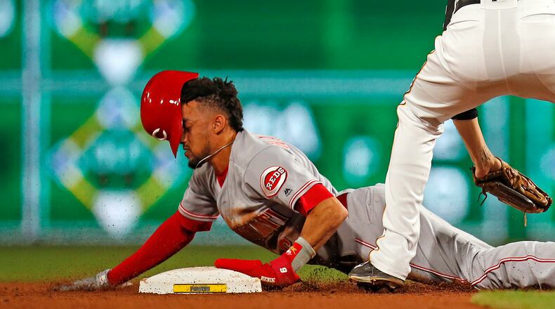 PITTSBURGH, PA - JUNE 15: Billy Hamilton #6 of the Cincinnati Reds steals second base in the ninth inning against Jordy Mercer #10 of the Pittsburgh Pirates at PNC Park on June 15, 2018 in Pittsburgh, Pennsylvania. (Photo by Justin K. Aller/Getty Images)