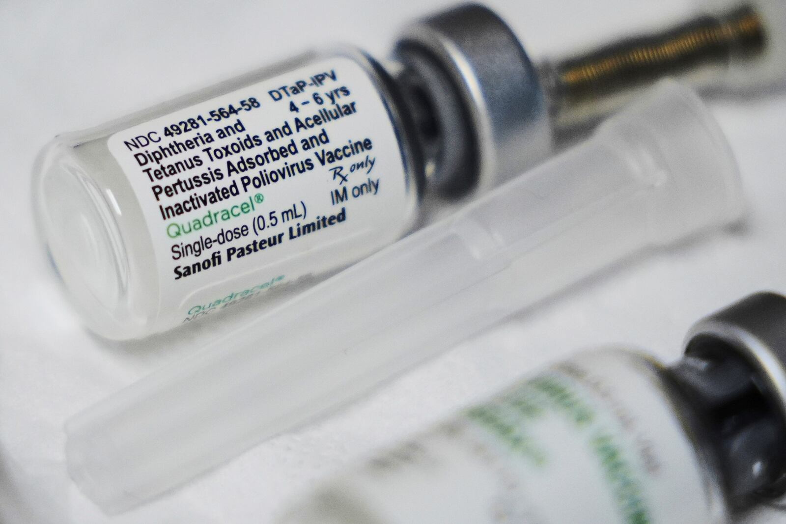 A childhood vaccination that includes a polio dose is prepared at the Dallas County Health and Human Services immunization clinic in Dallas, Friday, April 4, 2025. (AP Photo/LM Otero)