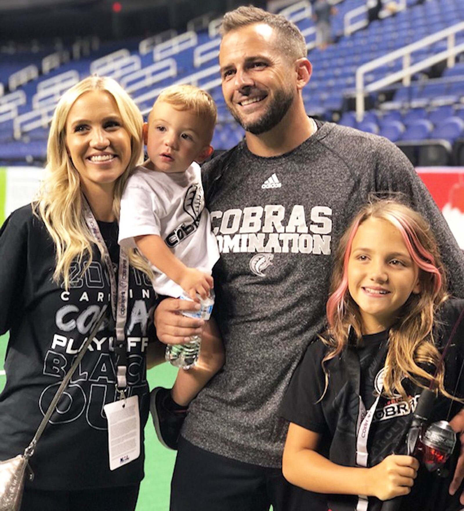Carolina head coach Billy Back poses with his wife Stacie, son Larkin and daughter London after the Cobras’ first National Arena League playoff win last season at the Greensboro Coliseum in Greensboro, N.C. PHOTO COURTESY OF CAROLINA COBRAS