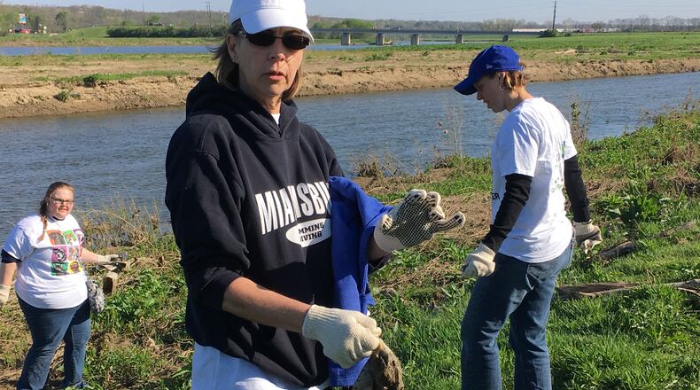 Volunteers during previous Keep Middletown Beautiful events on Earth Day. STAFF FILE PHOTO