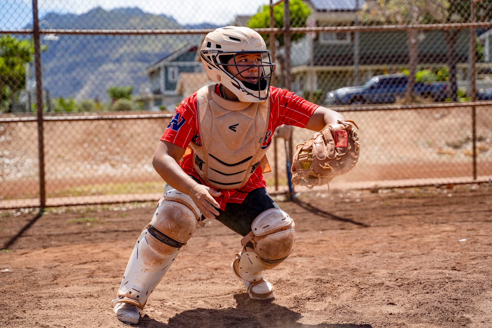 Ry-n Uyeda runs through a catching drill, Friday, July 11, 2025, in Waianae, Hawaii. (AP Photo/Mengshin Lin)