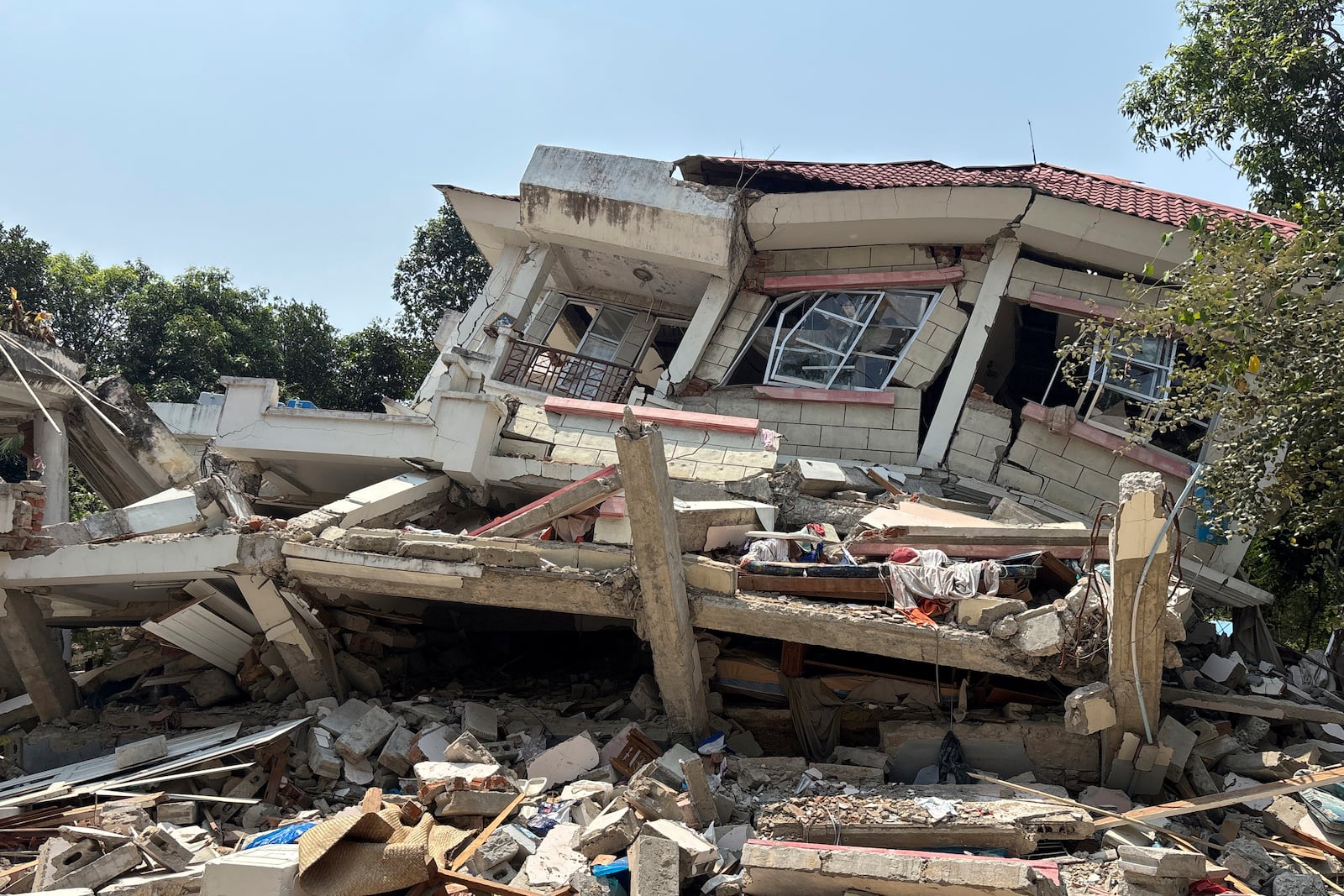 A damaged building is seen in Naypyitaw, Myanmar, Monday, April 28, 2025, one month after the earthquake. (AP Photo/Aung Shine Oo)