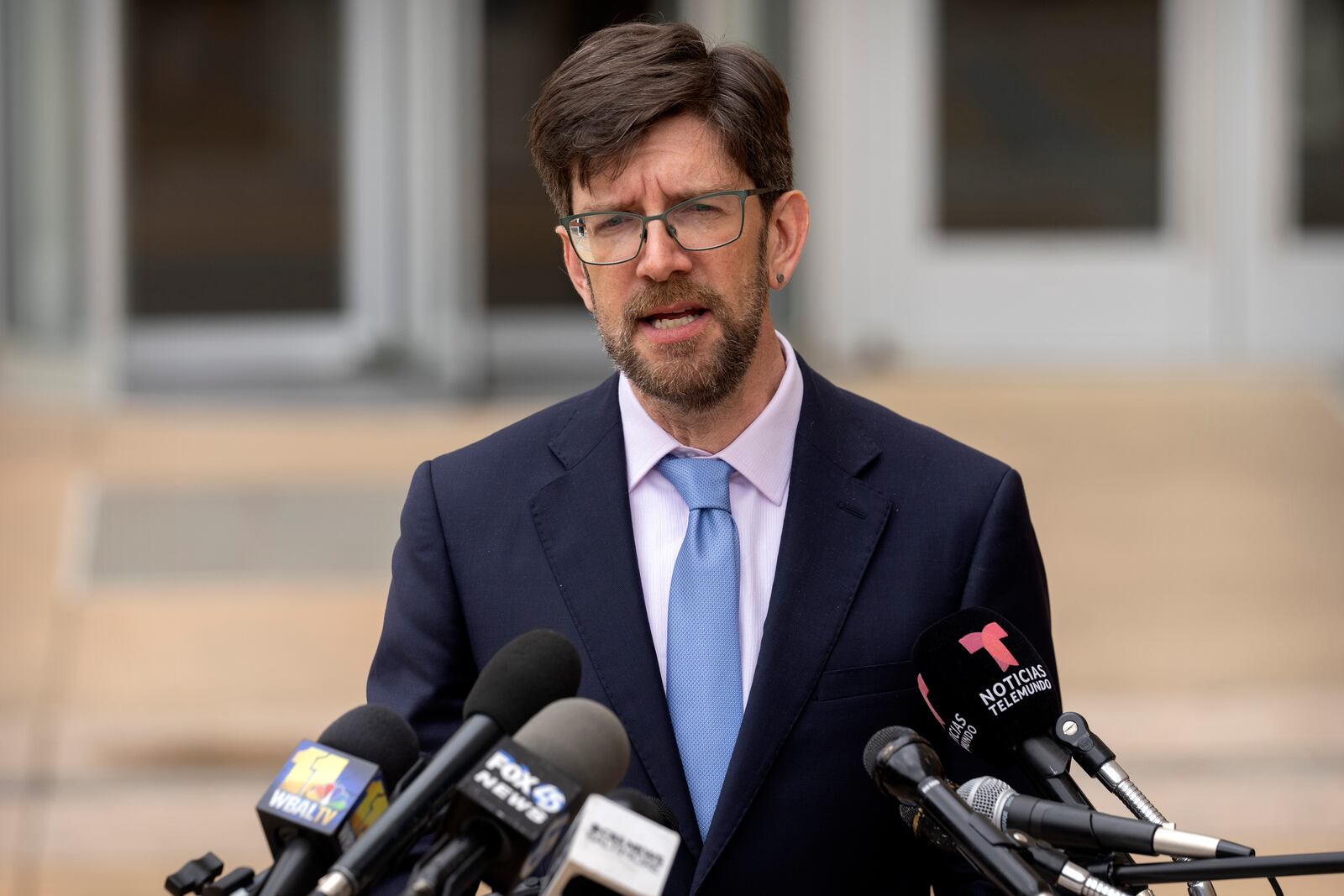 Simon Sandoval-Moshenberg, an attorney for Kilmar Abrego Garcia, speaks to reporters after a hearing at the U.S. District Court in Greenbelt, Md., Monday, July 7, 2025. (AP Photo/Mark Schiefelbein)