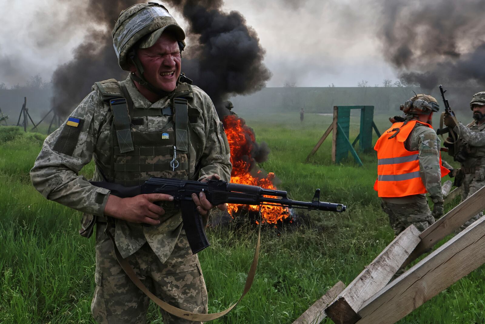In this photo provided by Ukraine's 65th Mechanized Brigade press service, Ukrainian servicemen attend a military training in Zaporizhzhia region, Ukraine, Monday, May 26, 2025. (Andriy Andriyenko/Ukraine's 65th Mechanized Brigade via AP)