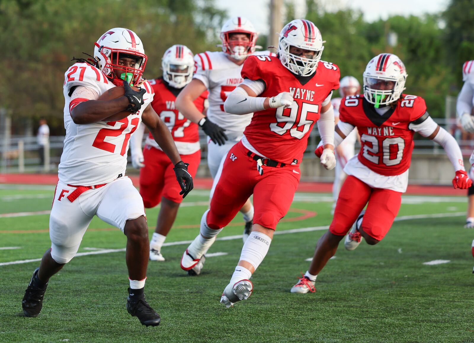 Fairfield senior running back Michael LaCue runs during a nonconference game against Wayne on Friday, Aug. 22 at Heidkamp Stadium in Huber Heights. BRYANT BILLING / STAFF