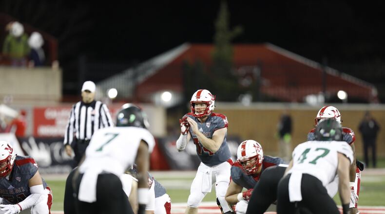 Miami quarterback Gus Ragland prepares to field a snap during last week’s game vs. Ohio. PHOTO courtesy of Miami athletics