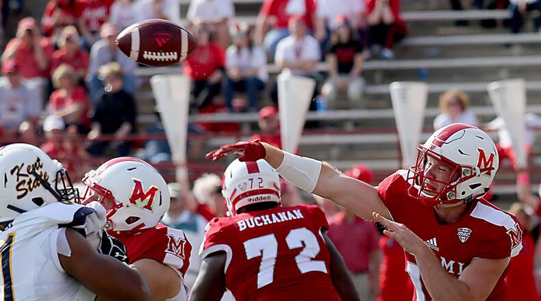 Miami quarterback Gus Ragland throws against Kent State during their game at Yager Stadium in Oxford Saturday, Oct. 15, 2016. Contributed Photo by E.L. Hubbard