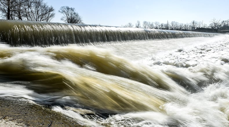 Someday, the low-level dam upriver of Hamilton’s downtown may be removed, or modified, so boaters can float through gaps in it. NICK GRAHAM/STAFF