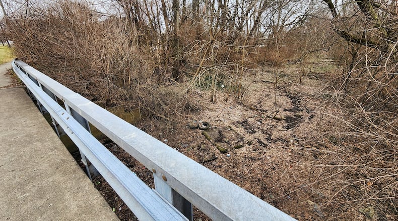 A man was found face down in a canal Tuesday morning along Wilbraham Road in Middletown. NICK GRAHAM/STAFF