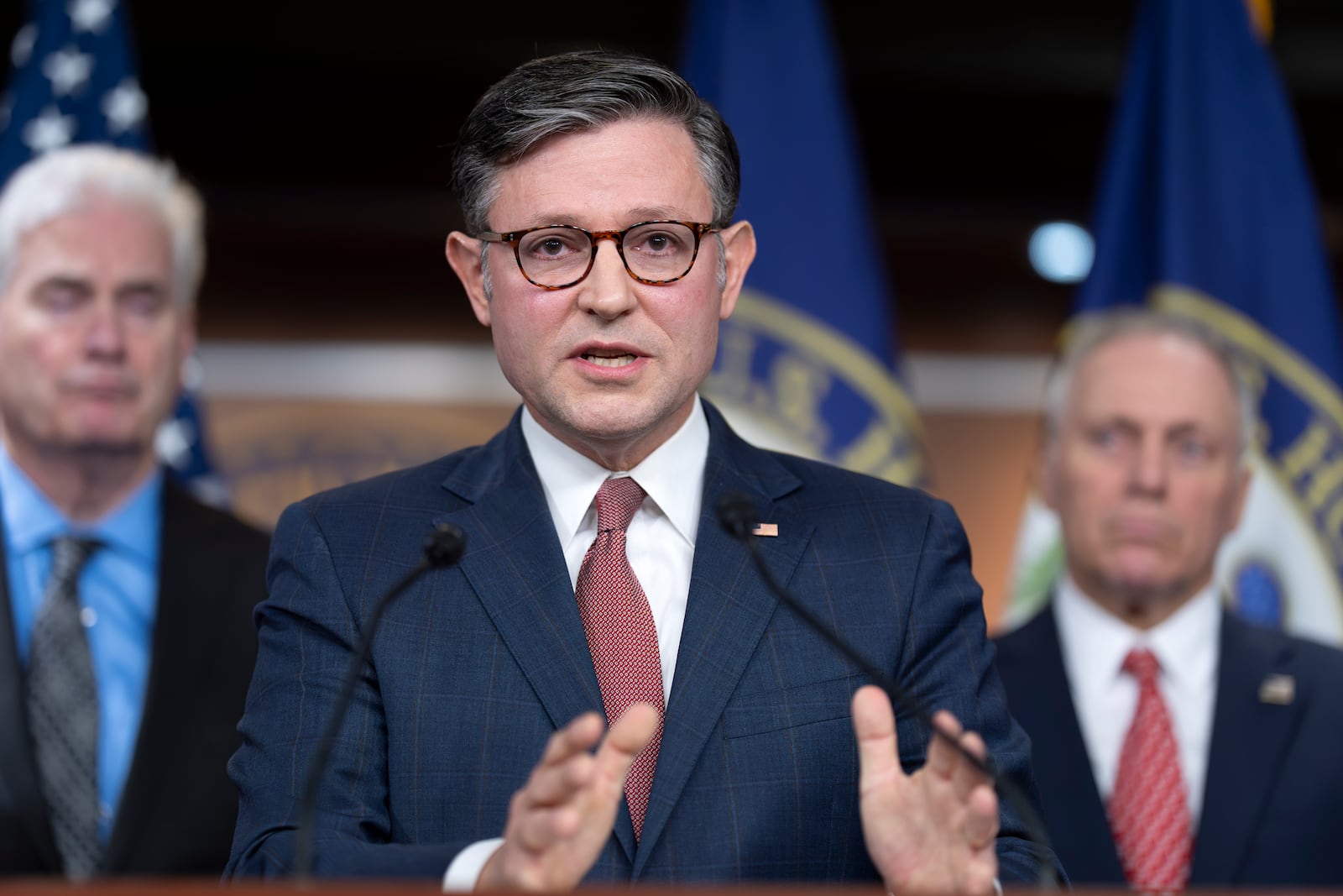 Speaker of the House Mike Johnson, R-La., flanked by Majority Whip Tom Emmer, R-Minn., left, and Majority Leader Steve Scalise, R-La., blames Democrats, former President Joe Biden, and Republican lawmaker Thomas Massie of Kentucky, over the Jeffrey Epstein situation, during a news conference at the Capitol in Washington, Tuesday, July 22, 2025. (AP Photo/J. Scott Applewhite)