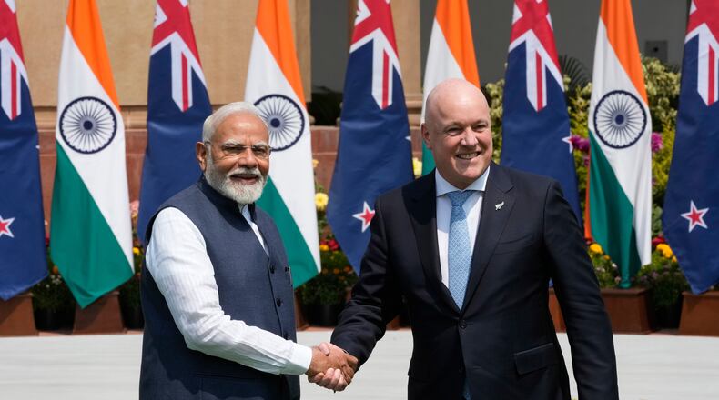 FILE - Indian Prime Minister Narendra Modi, left, greets visiting New Zealand Prime Minister Christopher Luxon before their meeting in New Delhi, India, Monday, March 17, 2025. (AP Photo/Manish Swarup, File)