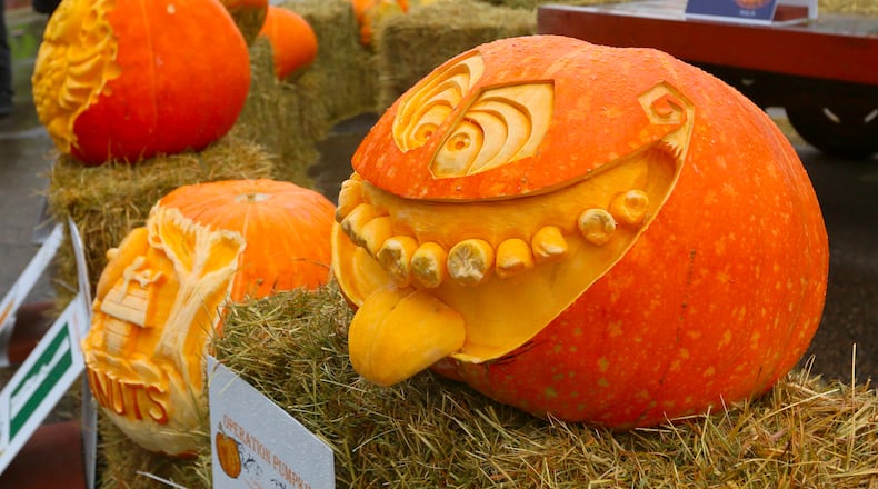 A variety of carved pumpkins are seen on display during a previous Operation Pumpkin event in downtown Hamilton. This year's event is Oct. 7-9 on High Street and on side streets. FILE PHOTO