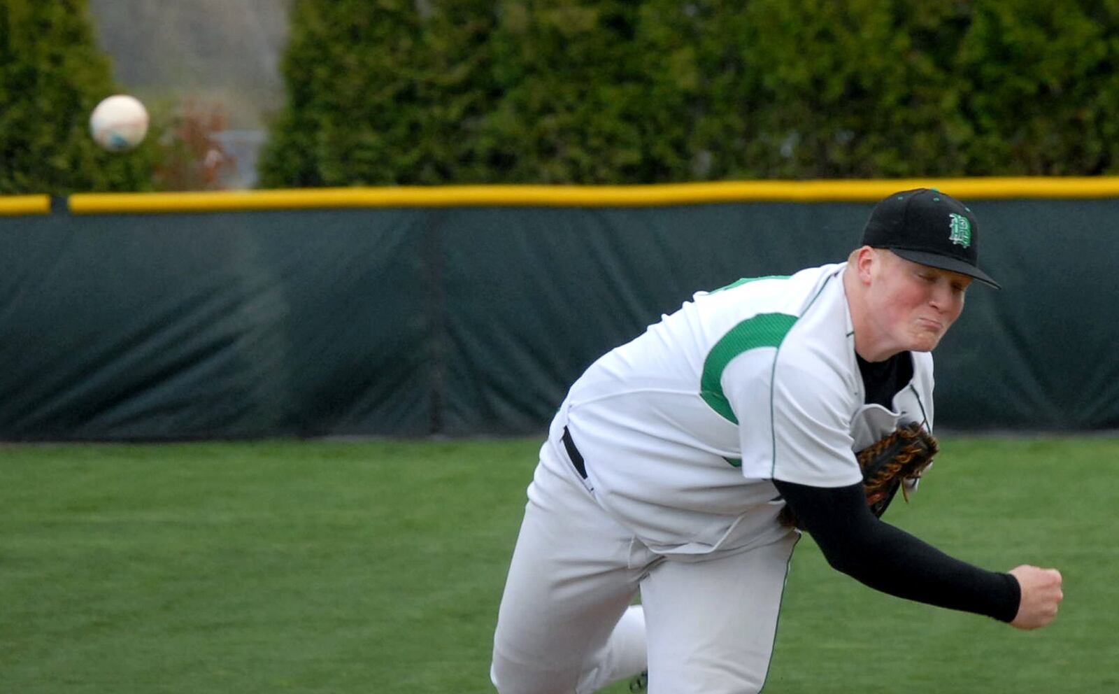 Badin’s Brett McKinney fires the ball toward home plate during a Greater Catholic League game against Moeller on April 14, 2008, at Alumni Field in Hamilton. JOURNAL-NEWS FILE PHOTO