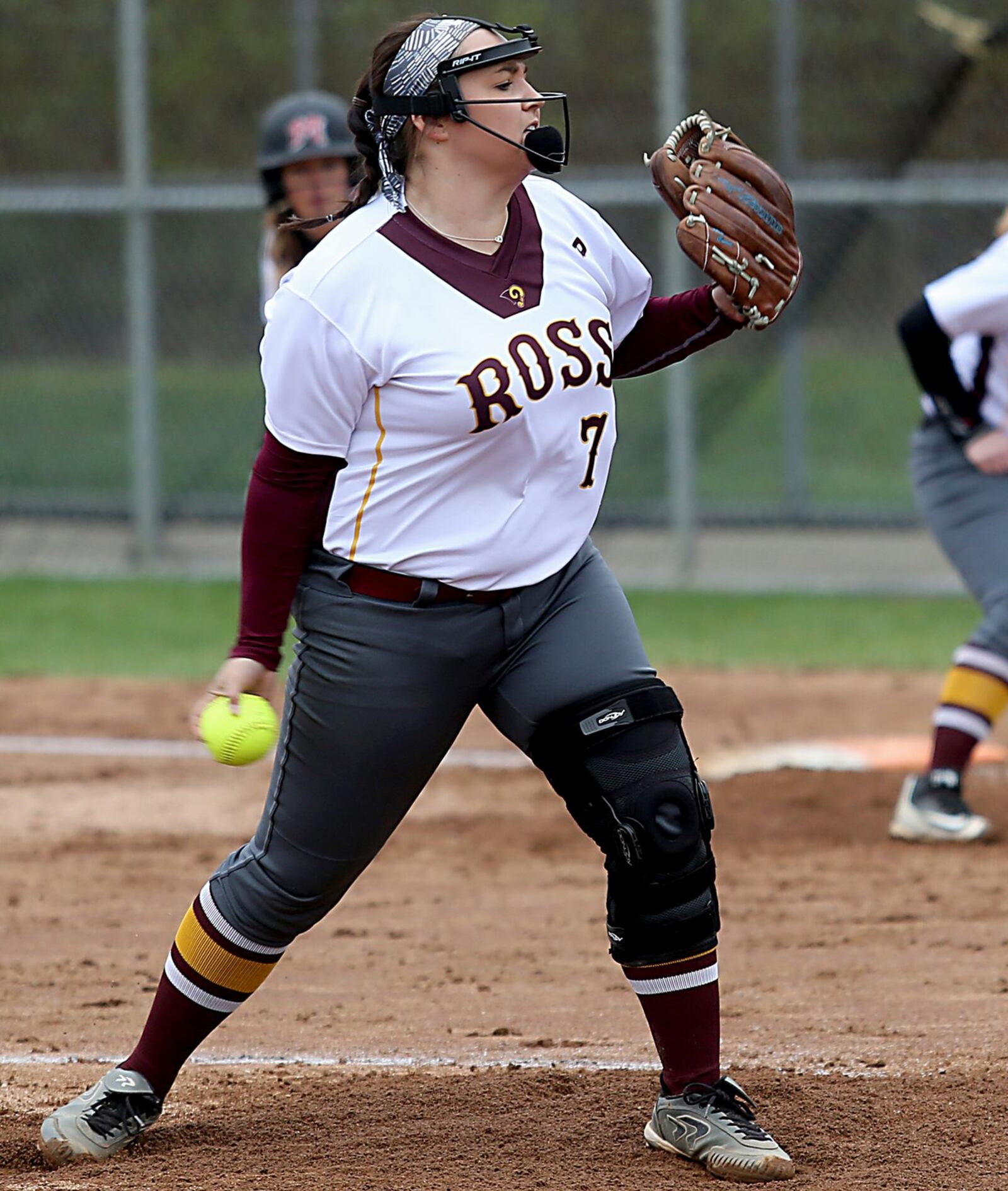 Ross pitcher Kenzie Meyer sends the ball toward the plate Saturday during a game against visiting Madison. CONTRIBUTED PHOTO BY E.L. HUBBARD