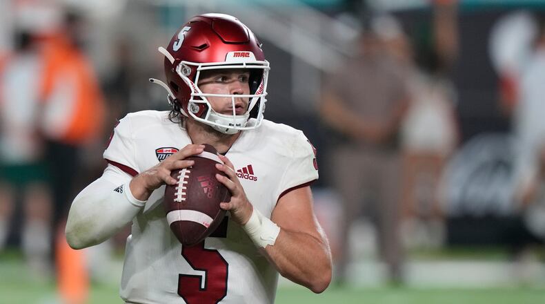 Miami University quarterback Brett Gabbert looks for an open teammate during action earlier this season. Gabbert was an efficient 15-of-18 for 170 yards and two touchdowns in Saturday's win over Bowling Green. Wilfredo Lee / AP