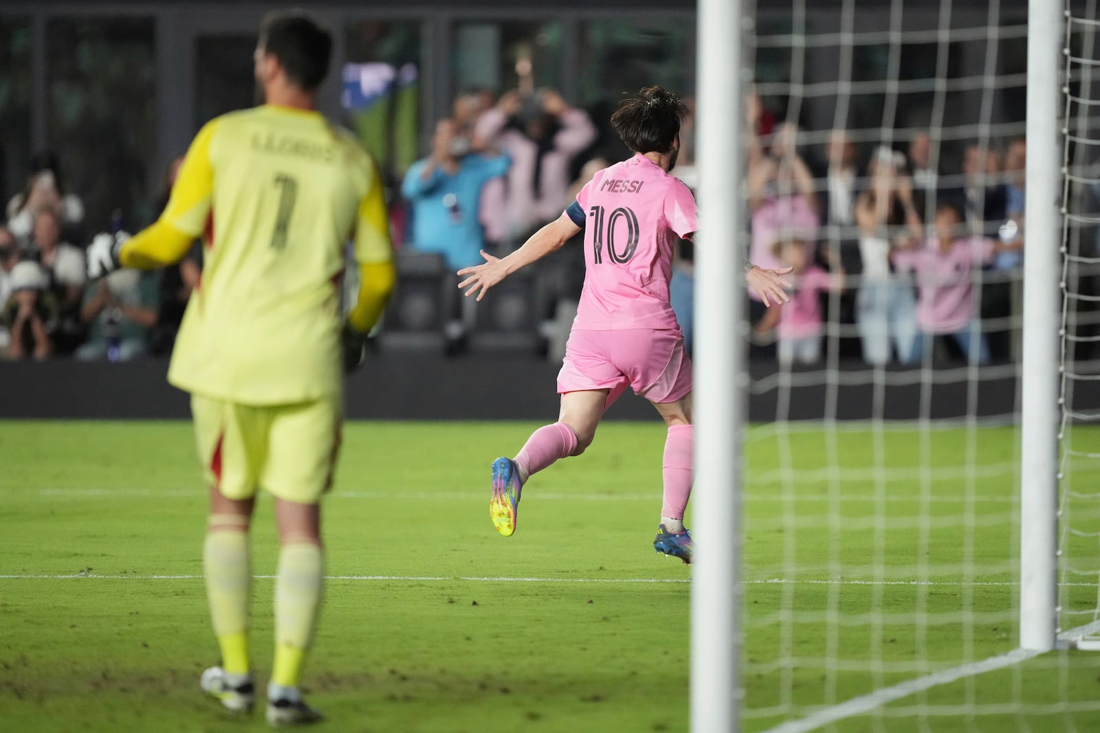 Inter Miami forward Lionel Messi (10) celebrates scoring on a penalty kick against the Los Angeles FC during the second half of a CONCACAF Nations League Quarterfinal Match at Chase Stadium, Wednesday, April 9, 2025 in Fort Lauderdale, Fla. (AP Photo/Jim Rassol)
