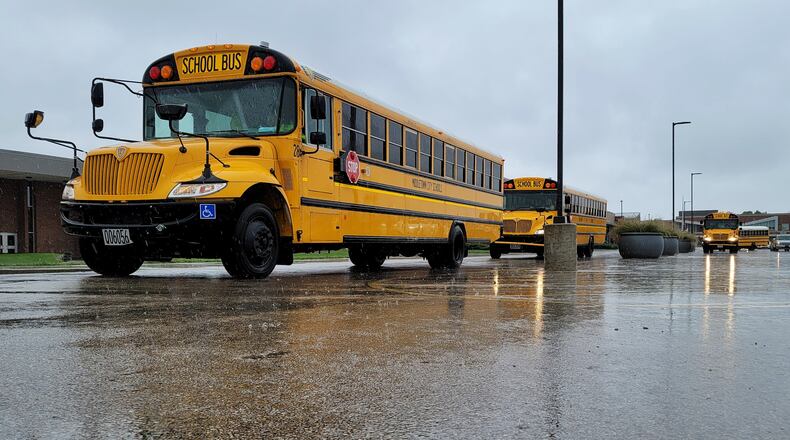 Buses line up to pick up students at Middletown High School Wednesday, Sept. 22, 2021. Schools around the area are facing a shortage of bus drivers. NICK GRAHAM / STAFF