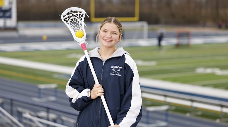 Edgewood High School senior lacrosse player Kamdyn Buck scored her 100th career goal in the first game this season. NICK GRAHAM/STAFF