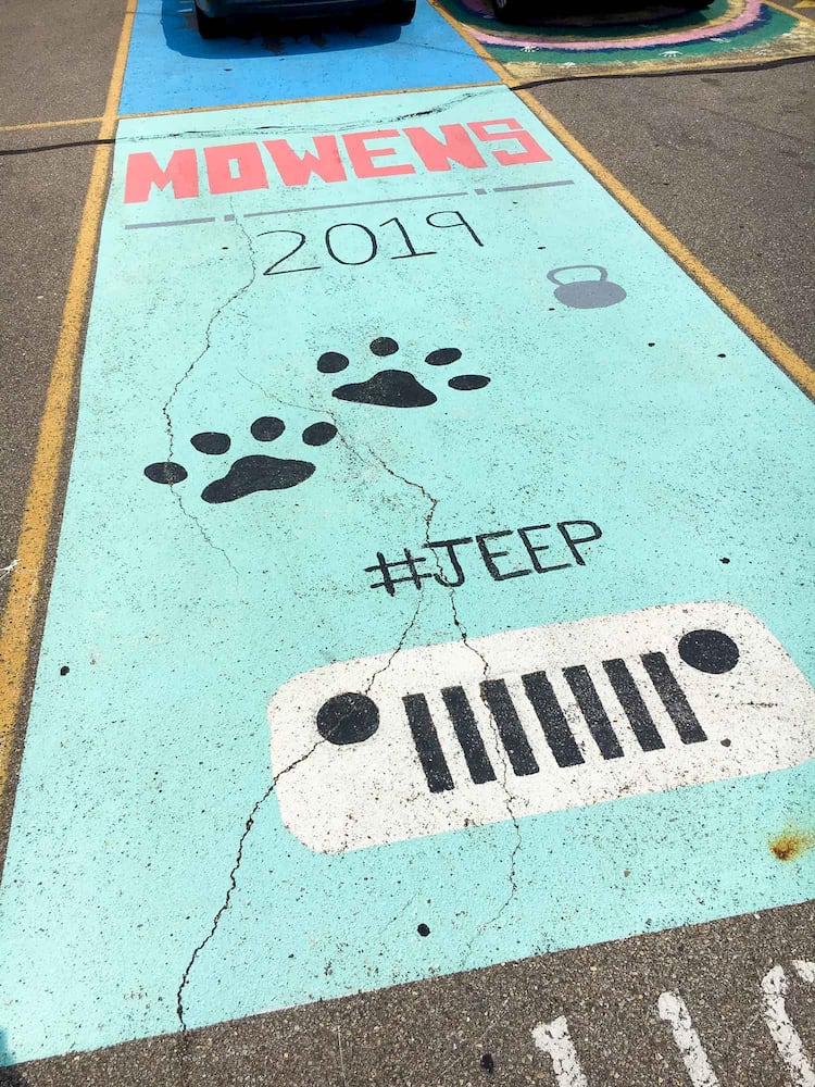PHOTOS Lakota East seniors paint parking spots