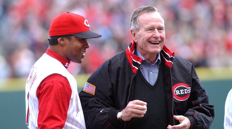 George H.W. Bush appears with Cincinnati Reds shortstop Barry Larkin before the 2003 Opening Day at Great American Ball Park.