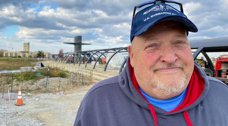 Former USS Cincinnati nuclear submarine veteran Scott Lucas recently got to “come aboard” again at the construction site of the attack sub’s coming $9.5 million Cold War memorial in Butler County. The local U.S. Navy veteran said it was emotional and special to see up close the reassembling of the submarine he spent years on traveling beneath the world’s oceans as a radio crew member on the sub’s main command deck. (Photo By Michael D. Clark/Journal-News)