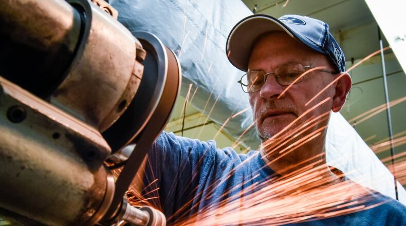 Donnie Duncan grinds a punch on his machine at Tipco Punch Tuesday, Jan. 8, 2019 in Fairfield. Duncan was the first employee hired in 1979 and has worked at the company for 40 years. NICK GRAHAM/STAFF