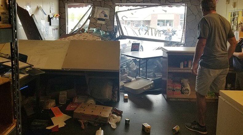 A vehicle crashed May 3 through the front of the Fairfield Food Pantry on Magie Road. CONTRIBUTED