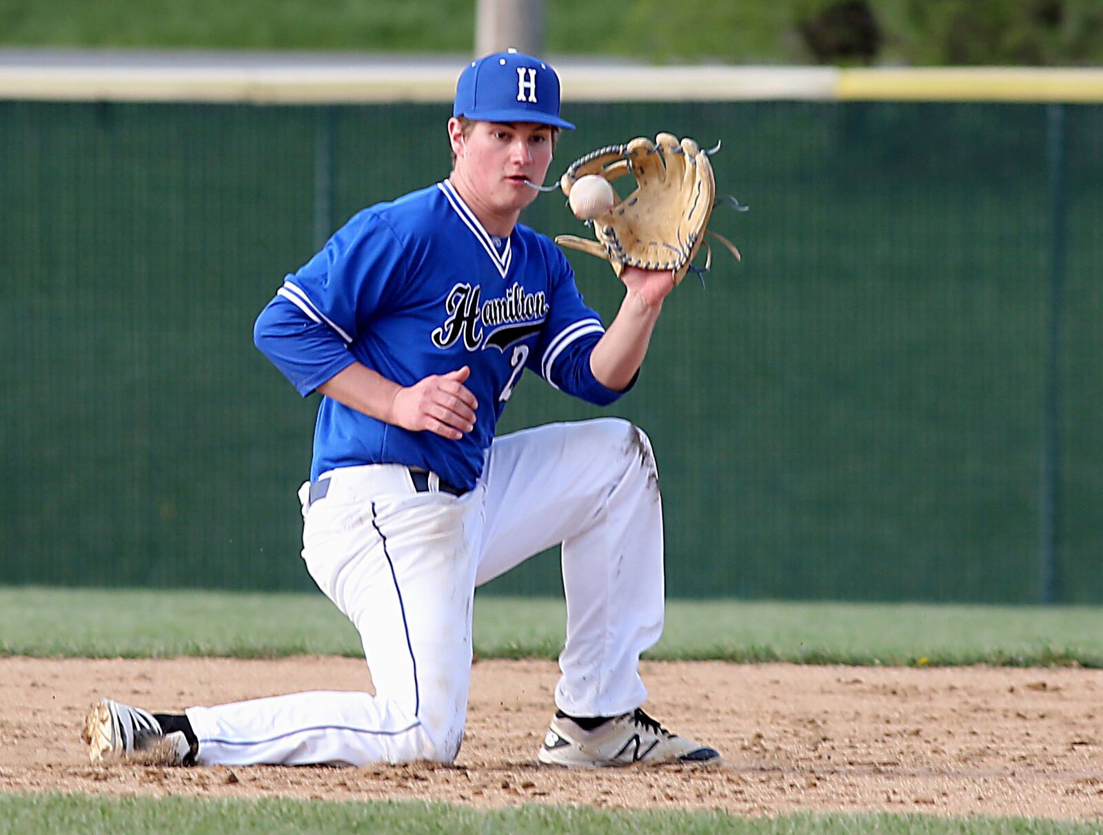 Hamilton third baseman Eric Roberts fields a Lakota West ground ball during their game in West Chester Township on Sunday. CONTRIBUTED PHOTO BY E.L. HUBBARD
