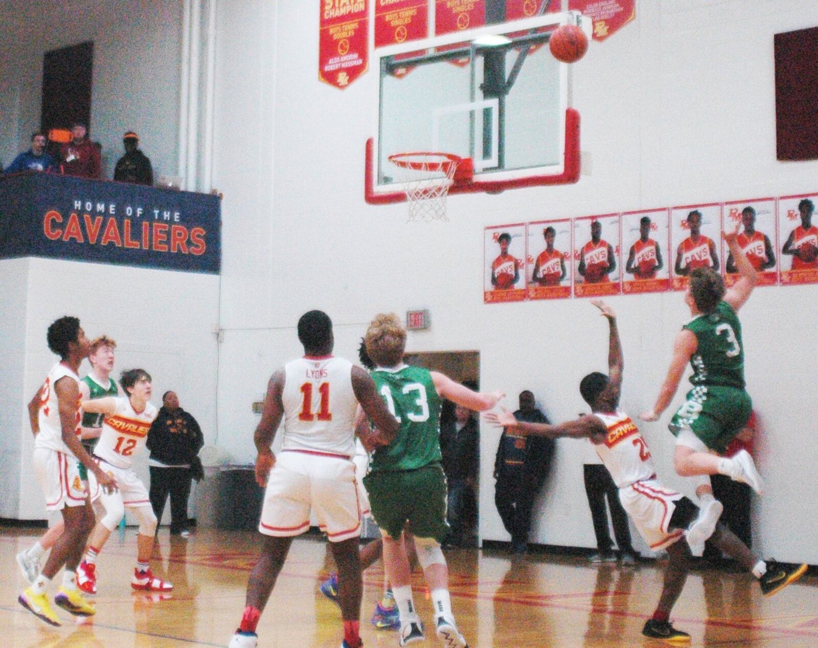 Badin’s Nathan Hegemann (3) gets a shot up over Purcell Marian’s Dustin Davis (25) during Friday night’s game at the Eveslage Athletic Center. Host Purcell won 74-60. RICK CASSANO/STAFF