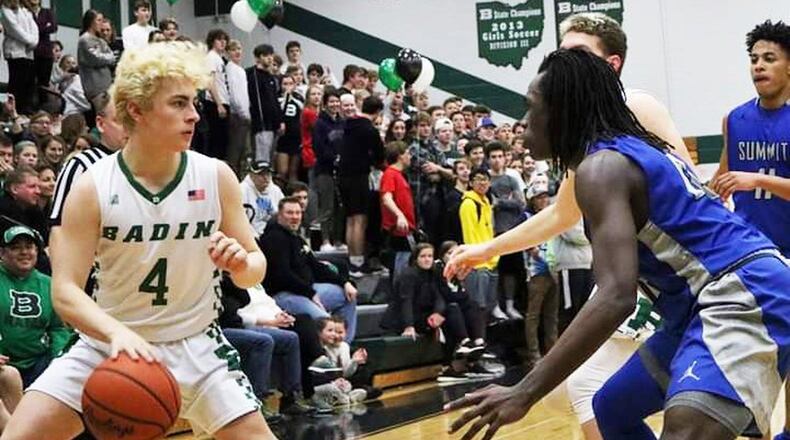 Badin’s Easton Scowden (4) dribbles against Summit Country Day’s Benjamin Toble during Tuesday night’s game at Mulcahey Gym in Hamilton. Badin won 49-39. CONTRIBUTED PHOTO BY TERRI ADAMS