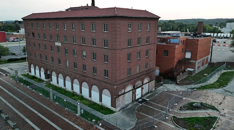 CMC Properties could place a mixed-use development on the site of the Manchester Inn and Sonshine Buildings, which would require both buildings be demolished. NICK GRAHAM/STAFF