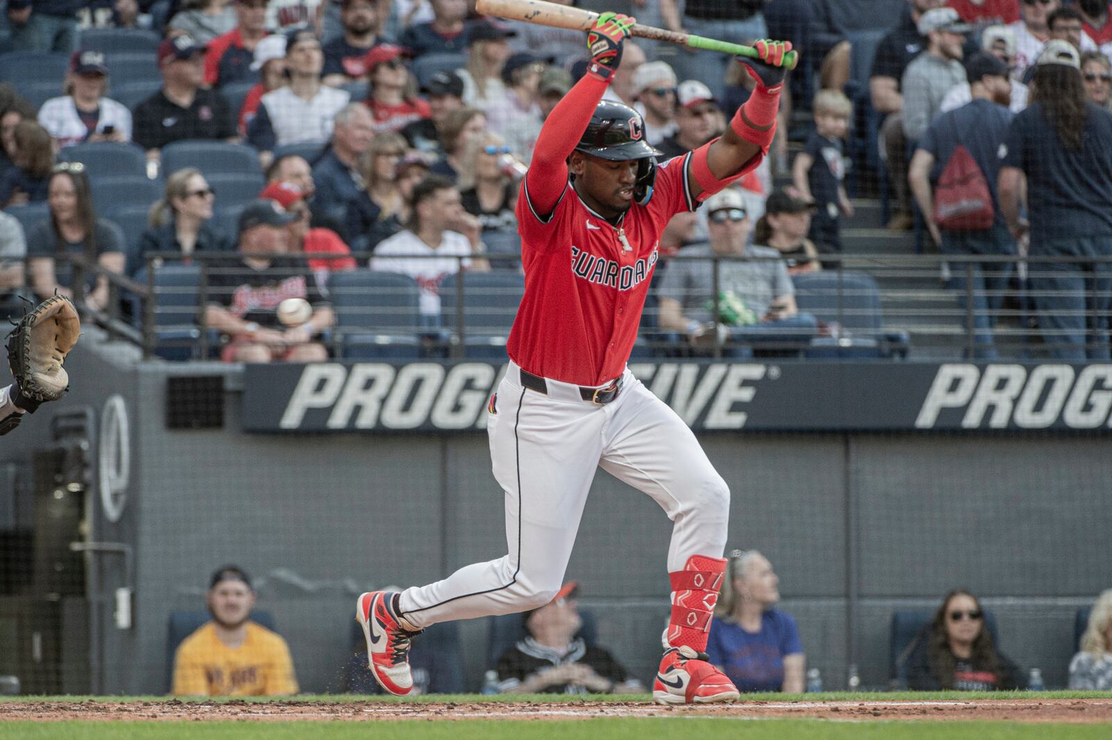 Cleveland Guardians' Angel Martinez dodges an inside pitch from Philadelphia Phillies starting pitcher Ranger Suarez during the third inning of a baseball game Saturday, May 10, 2025, in Cleveland. (AP Photo/Phil Long)